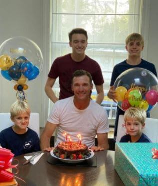 Alexander Shevchenko with his siblings celebrating the birthday of their father Andriy Shevchenko.